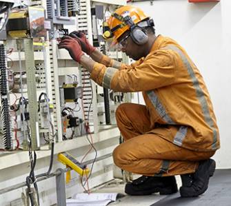 Join Our Team - A Picture of a STELCO electrician testing a panel